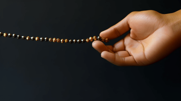 Removing the last character from a string represented by a bead necklace.