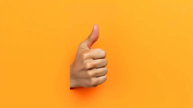 Hand clicking a like button on a website
